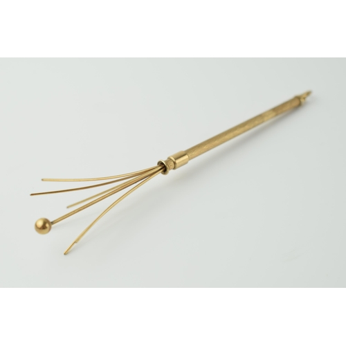 544 - 9ct gold mechanical cocktail stirrer / swizzle stick, 12.5cm extended, 5.0 grams gross weight.