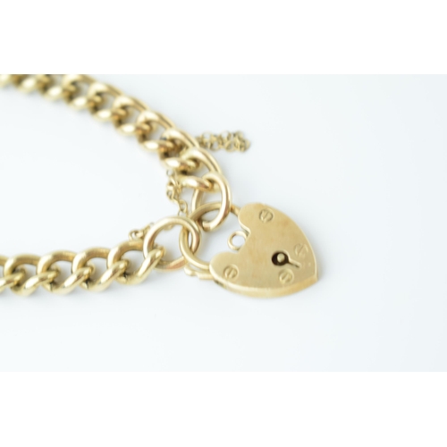 549 - 9ct gold curb link bracelet with heart shaped padlock, with safety chain, fully hallmarked, 23.1 gra... 