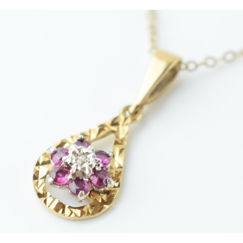 551 - 9ct gold pendant set with a diamond and amethysts on 9ct gold chain, 1.9 grams, chain length 41cm.