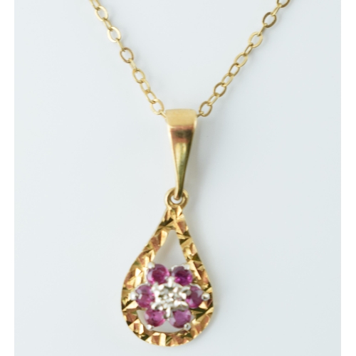 551 - 9ct gold pendant set with a diamond and amethysts on 9ct gold chain, 1.9 grams, chain length 41cm.