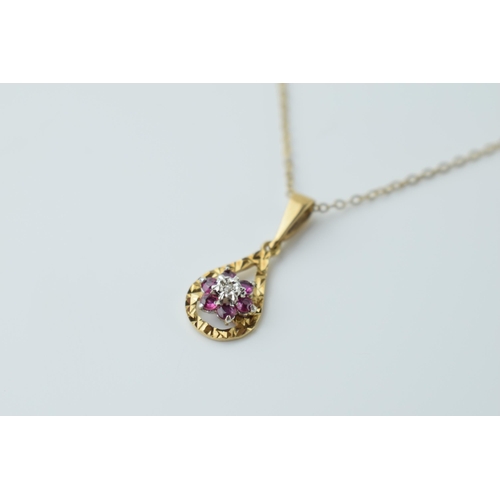 551 - 9ct gold pendant set with a diamond and amethysts on 9ct gold chain, 1.9 grams, chain length 41cm.