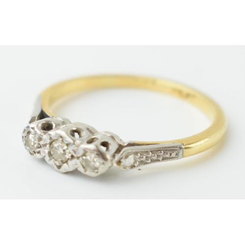 552 - 18ct gold and platinum ladies 3 stone diamond ring, size L, 2.0 grams.