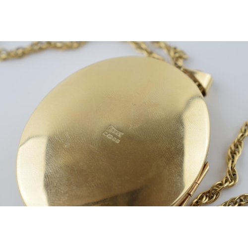 555 - 9ct gold large locket with engraved floral decoration on 9ct gold link necklace, 34.2 grams, with or... 