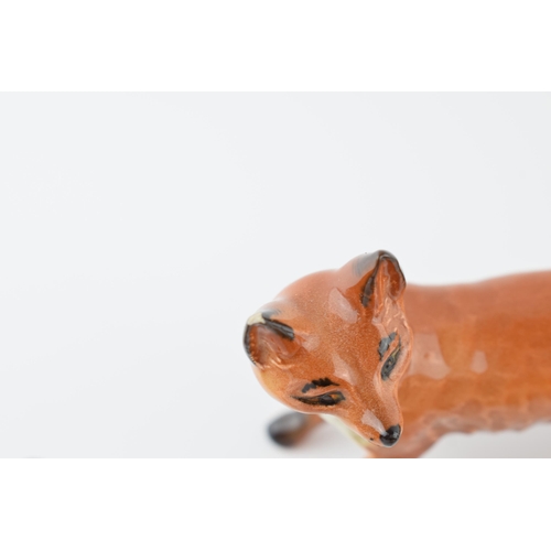 56 - Beswick foxes to include comical fox 173, lying fox 1017 and 2 others (4).