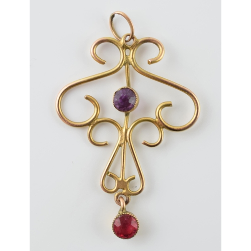 568 - Edwardian 9ct gold pendant set with an amethyst,  1.5 grams, 3.5cm long.