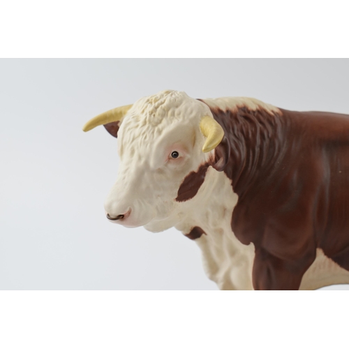 57 - Beswick Connoisseur model of a Hereford Bull on wooden base.