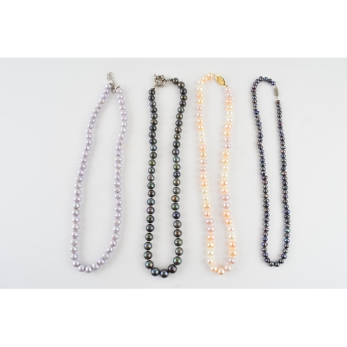 570 - A collection of 4 faux pearl necklaces of varying colours (4).