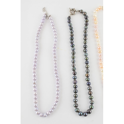 570 - A collection of 4 faux pearl necklaces of varying colours (4).