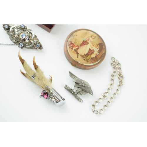 571 - A collection of jewellery to include Scottish Ptarmigan foot brooch with chrome plated mount, silver... 