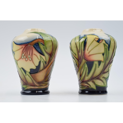 73 - Moorcroft 'Ode To May' pair of ovoid vases, 576/4 (2), 11cm tall.