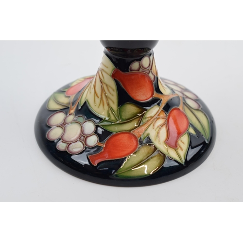 85 - Boxed Moorcroft candlestick in the Winter Harvest pattern, 98/3, trial.