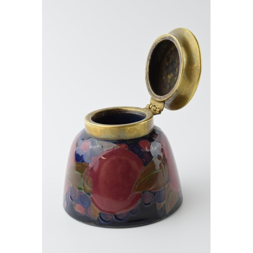 97 - Moorcroft Pomegranate inkwell with brass hinged lid, impressed 'Moorcroft', 7.5cm tall.