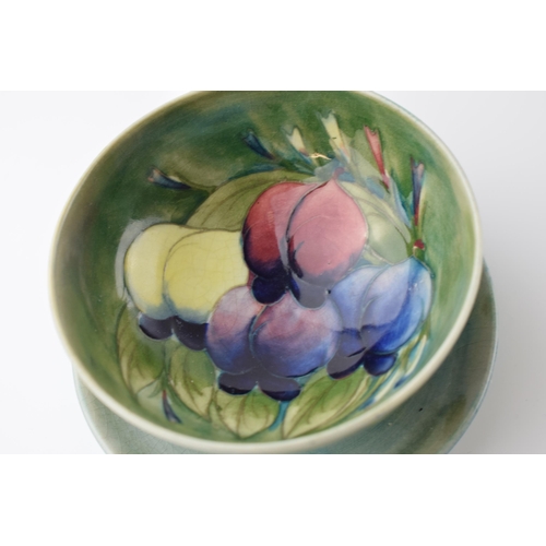 99 - Moorcroft grapefruit bowl in the Wisteria pattern, 12cm diameter.