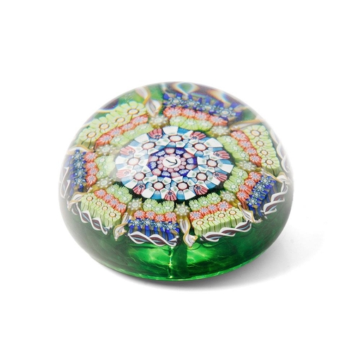 189 - Perthshire millefiori paperweight with multicoloured design, 7cm diameter, with arrow mark to centre... 