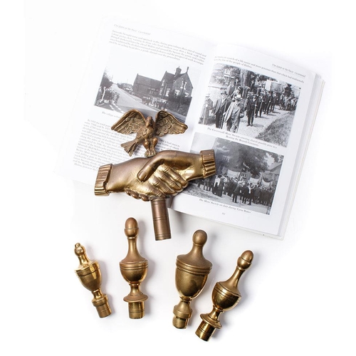 291 - 19th century brass finials relating to the Caverswall Men's Society, an organisation descended from ... 