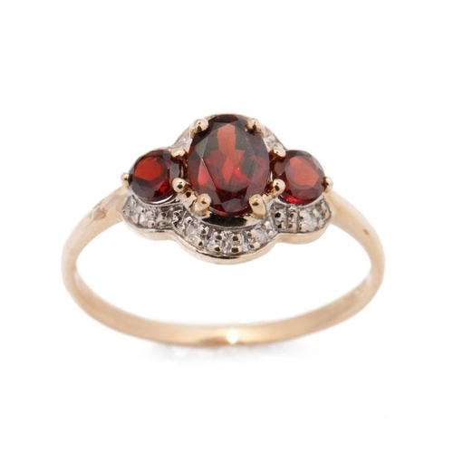 656 - 9ct gold garnet and diamond ring, 1.9 grams, size S.