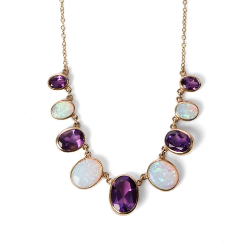 662 - 9ct gold amethyst and opal necklace set with 5 graduated amethysts and 4 graduated opals, 10.6 grams... 