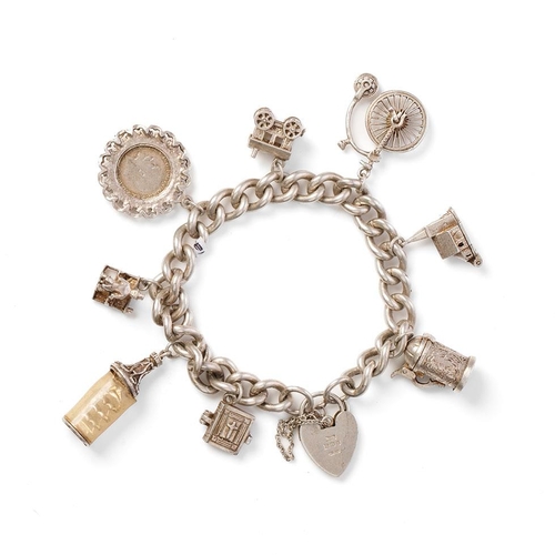 667 - Silver charm bracelet, 55.4 grams to include charms such as a Penny Farthing, a tankard, a church an... 