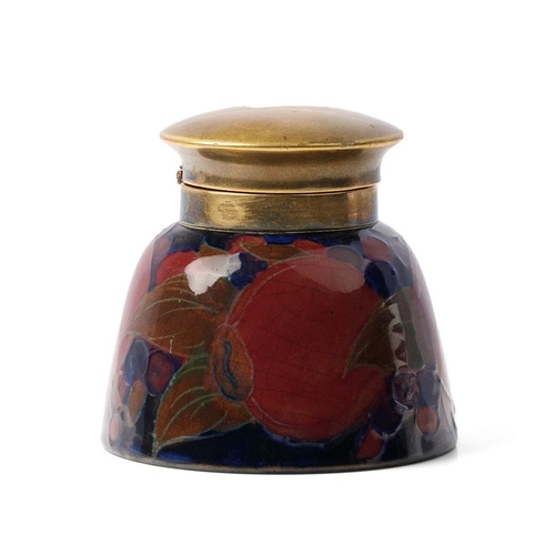 97 - Moorcroft Pomegranate inkwell with brass hinged lid, impressed 'Moorcroft', 7.5cm tall.