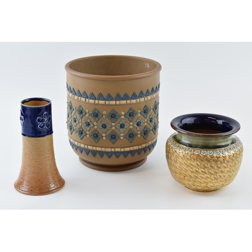 121 - A trio of Doulton Stoneware to include a hunting horn form vase with floral design, a gilt vase and ... 