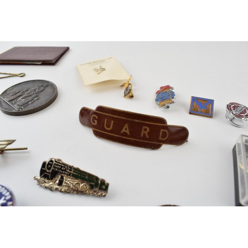 209 - A good collection of vintage enamel badges and similar items of railway, military and civilian inter... 