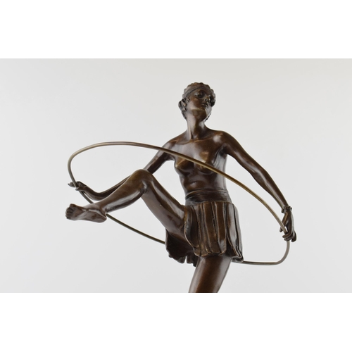 294 - Art Deco style figure in the form of a topless lady dancing with a hoop, signed 'D. Alonzo' on marbl... 