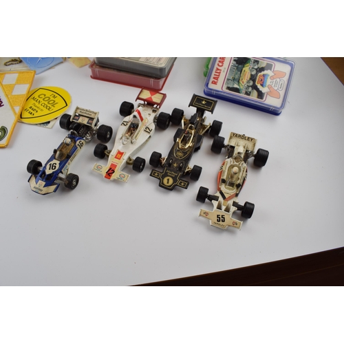 333 - A mixed collection of vintage toys to include Waddingtons Formula 1 'Racing Board Game', Corgi & Cor... 