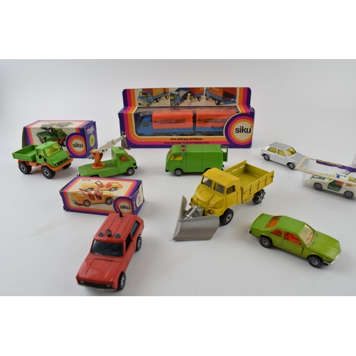 336 - Siku die-cast vintage toys to include, 1916 Truck with Trailer (boxed), 1620 Unimog (boxed), 1032 VW... 