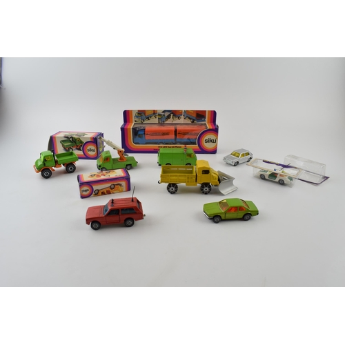 336 - Siku die-cast vintage toys to include, 1916 Truck with Trailer (boxed), 1620 Unimog (boxed), 1032 VW... 