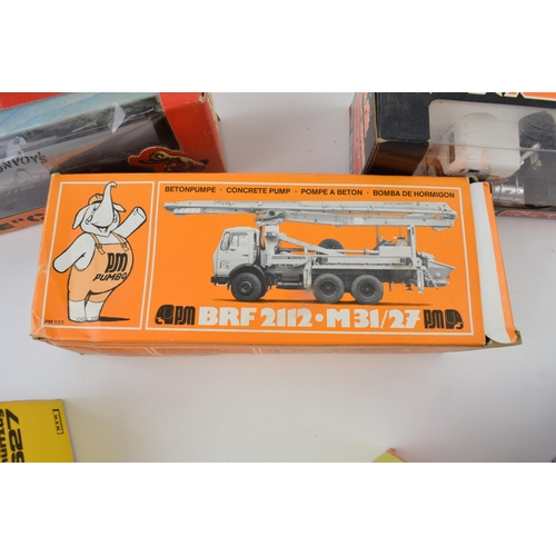 340 - A mixed collection of vintage  die-cast model vehicles to include, Shinsei Japan No. 631, Conrad Man... 