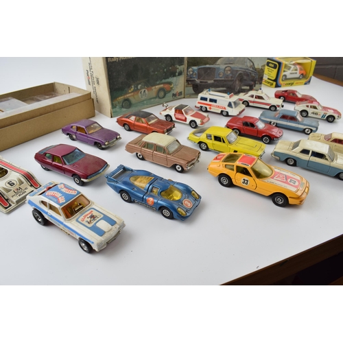 341 - A mixed collection of boxed and unboxed vintage die-cast model cars to include, Polistil 164E boxed,... 