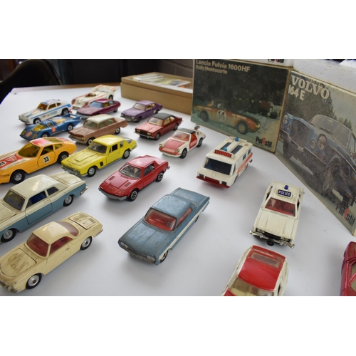 341 - A mixed collection of boxed and unboxed vintage die-cast model cars to include, Polistil 164E boxed,... 