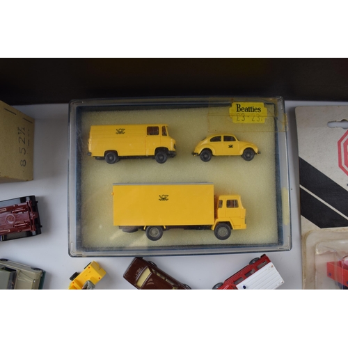 344 - A collection of die-cast and similar models to include Wiking, Herpa and Efsi Toys, for use with mod... 