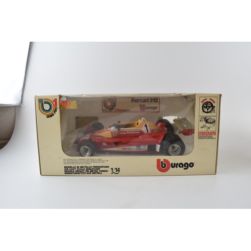 352 - Boxed die-cast Burago models 1/14 scale Grand Prix 1 together a Rolls Royce Camargue and another Pol... 