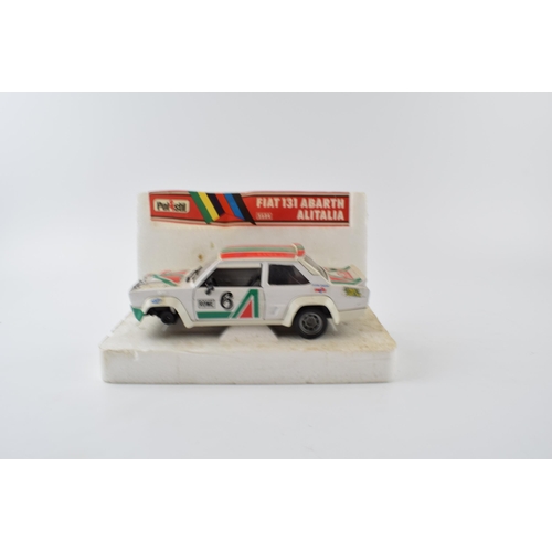 352 - Boxed die-cast Burago models 1/14 scale Grand Prix 1 together a Rolls Royce Camargue and another Pol... 