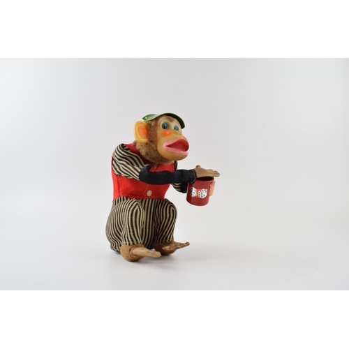 357 - Vintage Battery operated Cragstan 'Crap Shooting Monkey' Made in Japan and retailed in U.S.A by Crag... 