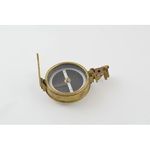 382 - A military style sighting compass in brass case with screw thread for attaching to stand or mount.