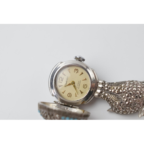 429 - Continental silver ornate ladies fob watch featuring an elephant on a ball, in ticking order, 65mm t... 