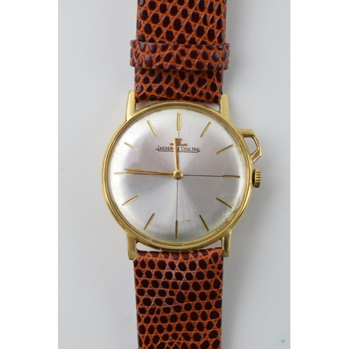 432 - 18ct gold cased Jaegar Le Coultre watch on leather strap, in wokring order, manual, 36mm.