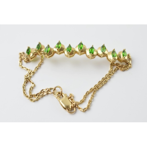 579 - 9ct gold bracelet set with semi precious stones, 7.6 grams.