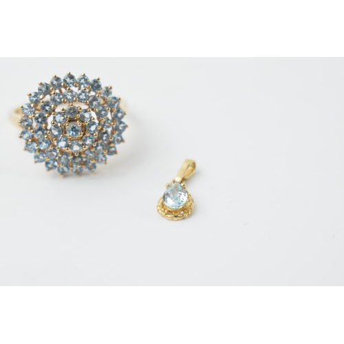 581 - 9ct gold ring set with light blue stones together with a matching pendant, 3.8 grams (2).