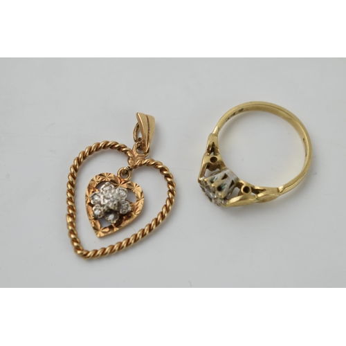 588 - 9ct gold floral pendant with a similar ring, size J, combined 3.8 grams (2).