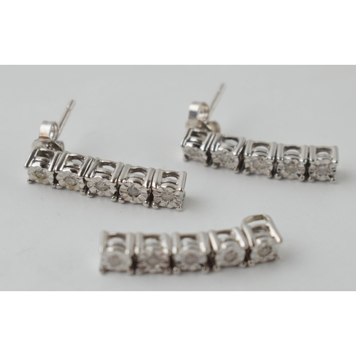 593 - 9ct white gold pair of earrings with matching pendant (3), 4.8 grams combined.