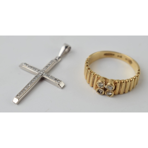 599 - 9ct gold 4 stone ring, size N, with a white gold diamond set cross (2), combined 4.1 grams.