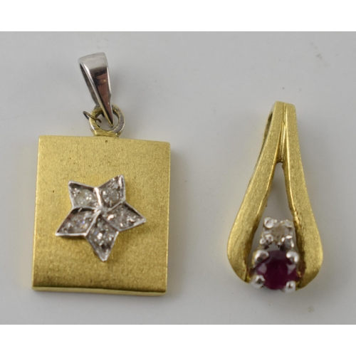 601 - A pair of 18ct gold pendants, both set with diamonds, combined 3.1 grams, tallest 20mm (2).