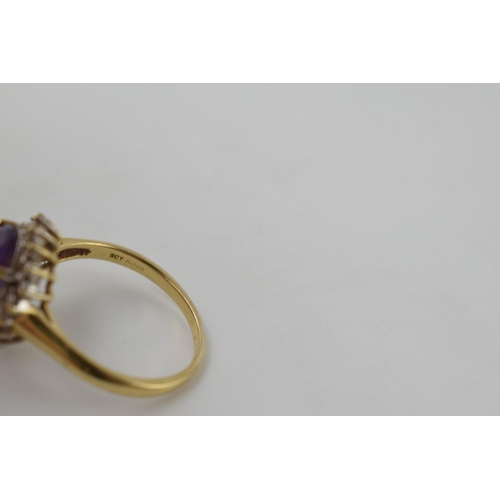 602 - 9ct gold diamond and amethyst ring, size V/W, 4.8 grams.