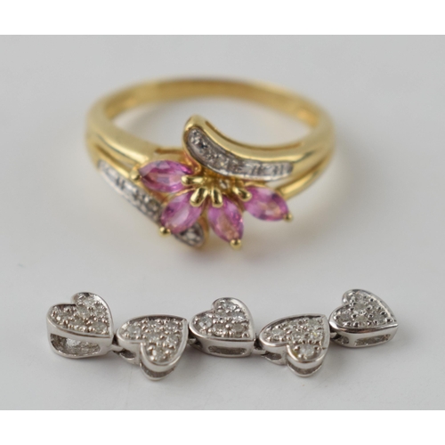 603 - 9ct gold floral leaf ring, size N, with a diamond set heart shaped pendant, combined 3.1 grams (2).