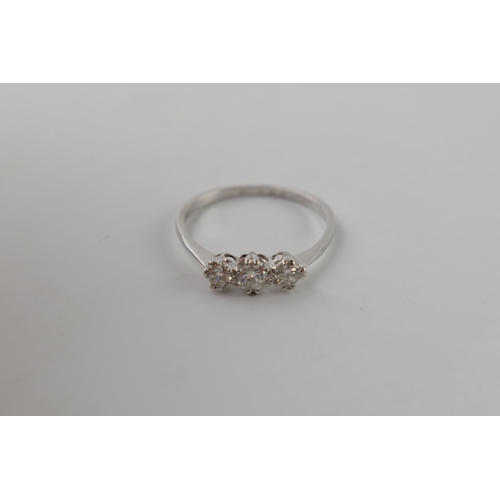 611 - Platinum ring set with 3 diamonds, 1.7 grams, size O.