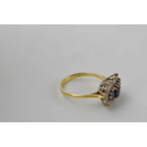 614 - 18ct gold ring set with synethetic sapphires and CZs, 3.6 grams, size L/M.