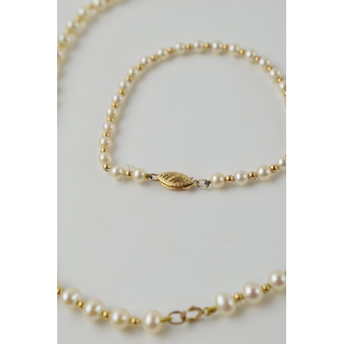 615 - A pearl necklace, set on a 9ct gold clasp, length 40.5cm, with a similar bracelet, length 19.5cm (2)... 